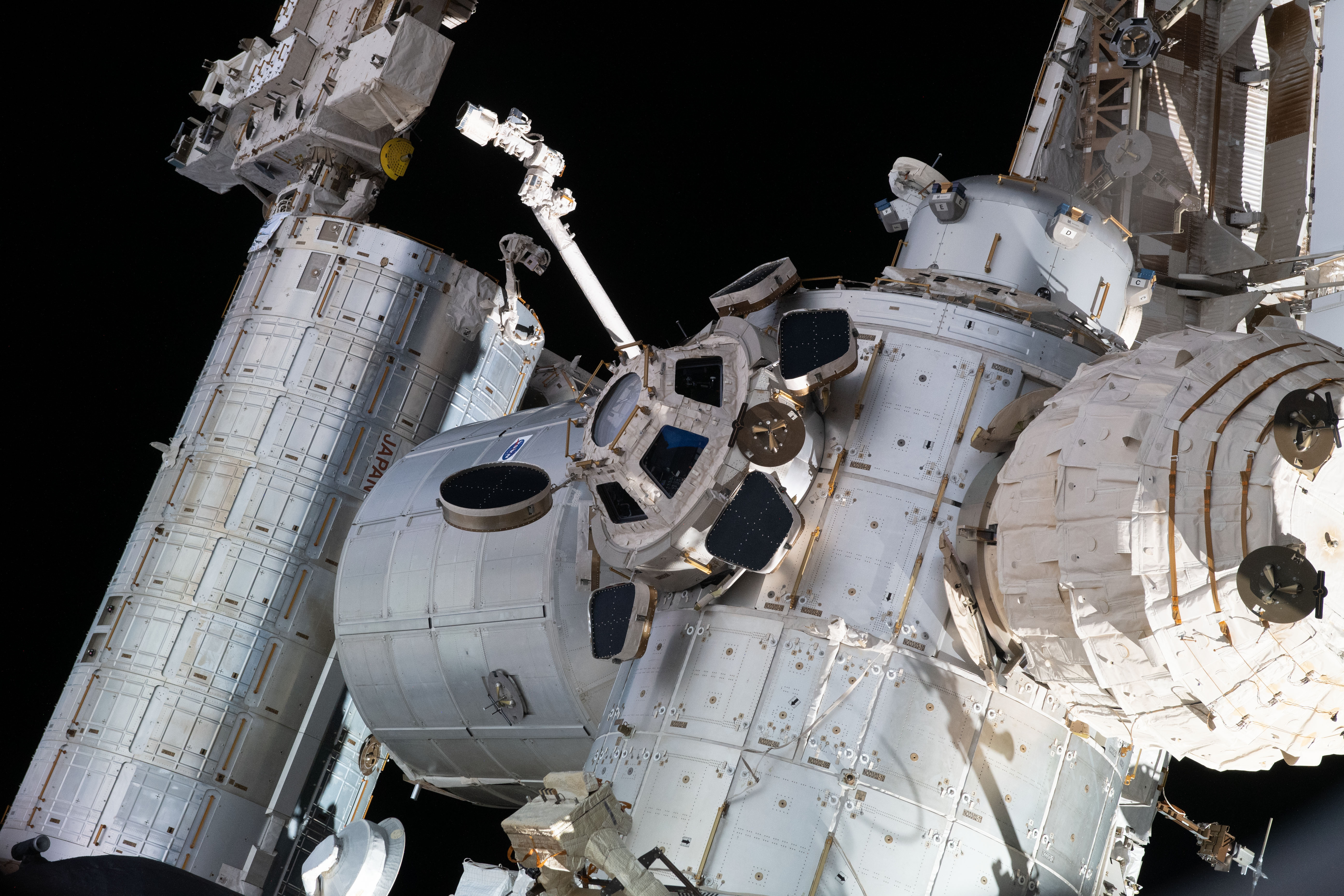 Portions of the space station are pictured from Nauka